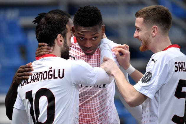 Rafael Leao of AC Milan celebrates with Franck Kessie and Hakan Calhanoglu after scoring the goal of 0-1 during the Serie A football match between US Sassuolo and AC Milan at Citta del Tricolore stadium in Reggio Emilia (Italy), December 20th 2020. Photo Andrea Staccioli Insidefoto andreaxstaccioli