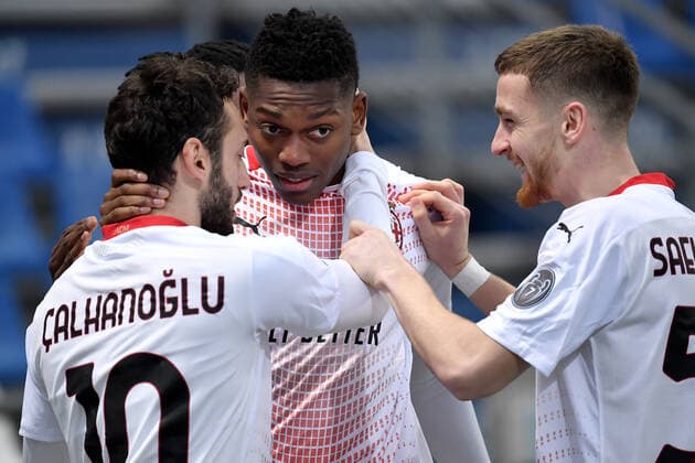 Rafael Leao of AC Milan celebrates with Hakan Calhanoglu and Alexis Saelemaekers after scoring the goal of 0-1 during the Serie A football match between US Sassuolo and AC Milan at Citta del Tricolore stadium in Reggio Emilia (Italy), December 20th 2020. Photo Andrea Staccioli Insidefoto andreaxstaccioli