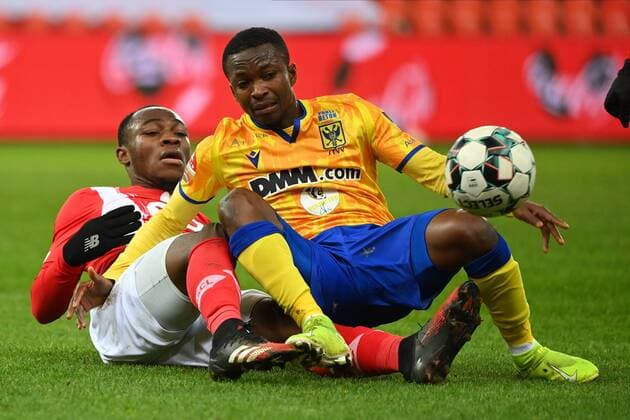 LIEGE, BELGIUM - DECEMBER 26 : Jackson Muleka forward of Standard Liege, Samuel Asamoah midfielder of Sint-Truiden during the Jupiler Pro League match between Standard Liege and Sint-Truidense VV on December 26, 2020 in Liege, Belgium, 26 12 2020 FOOTBBALL : Standard Liege Vs Saint-Trond - Jupiler Pro League - 26 12 2020 Photonews Panoramic  775545260