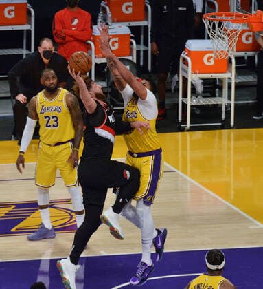 Portland Trail Blazers Jusuf Nurkic scores over Los Angeles Lakers Anthony Davis during the second half at Staples Center in Los Angeles on Monday, December 28, 2020. The Trail Blazers defeated the Lakers 115-107.  LAP2020122801 JIMxRUYMEN