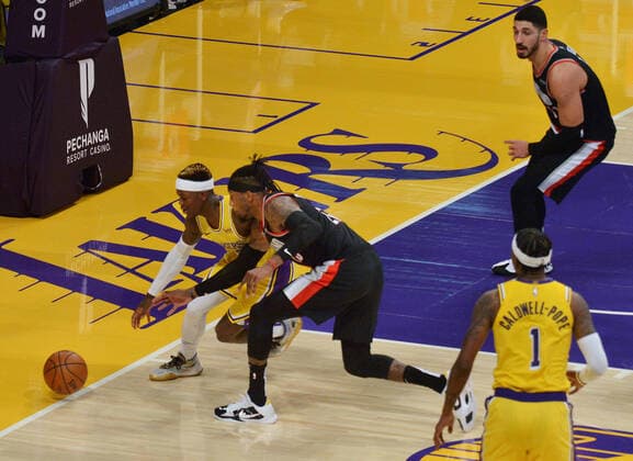 Portland Trail Blazers Robert Covington and Los Angeles Lakers Dennis Schroder chase the loose ball during the second half at Staples Center in Los Angeles on Monday, December 28, 2020. The Trail Blazers defeated the Lakers 115-107.  LAP2020122803 JIMxRUYMEN