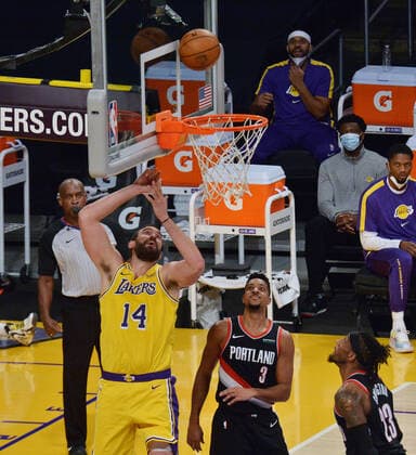 Los Angeles Lakers Marc Gasol scores over Portland Trail Blazers CJ McCollum during the second half at Staples Center in Los Angeles on Monday, December 28, 2020. The Trail Blazers defeated the Lakers 115-107.  LAP2020122815 JIMxRUYMEN