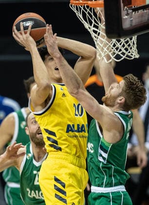 Basketball Euroleague, Alba Berlin Zalgiris Kaunas, Main Round, Matchday 17, Mercedes Benz Arena ALBAs Simone Fontecchio l jumps with the ball to the basket against Thomas Walkup of Zalgiris Kaunas ALBA Berlin Zalgiris Kaunas