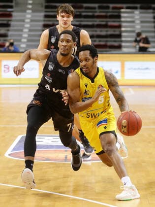 Ludwigsburg , Basketball easyCredit BBL Bundesliga , MHP RIESEN Ludwigsburg vs Hamburg Towers , from left Kameron Taylor Towers Barry Brown Riesen