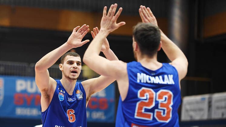Basketball 1 Bundesliga, Season 2020 2021, 11 Matchday, Syntainics MBC Weissenfels vs Fraport Skyliners Frankfurt Main 01 01 2021 Michalak, Michal MBC Weissenfels, Nr 23 r and Krstanovic, Marko MBC Weissenfels, Nr 6 li celebrate during the match MBC Weissenfels vs Fraport Skyliners 02 01 2021 Weissenfels Saxony Anhalt Germany Stadthalle Weissenfels