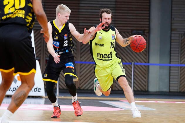 11 Matchday of the easyCredit BBL Basketball Bundesliga at the Oberfrankenhalle in Bayreuth Season 2020 2021 Medi Bayreuth vs MHP RIESEN Ludwigsburg Bastian Doreth Medi Bayreuth 10 right Jacob Patrick MHP RIESEN Ludwigsburg 2 left