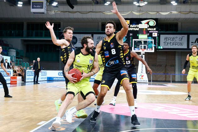 11 Matchday of the easyCredit BBL Basketball Bundesliga in the Oberfrankenhalle in Bayreuth Season 2020 2021 Medi Bayreuth vs MHP RIESEN Ludwigsburg Bastian Doreth Medi Bayreuth 10 middle Jordan Hulls MHP RIESEN Ludwigsburg 1 left Elias Harris MHP RIESEN Ludwigsburg 8 right