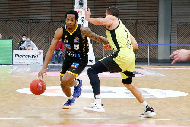 11 Matchday of the easyCredit BBL Basketball Bundesliga at Oberfrankenhalle in Bayreuth Season 2020 2021 Medi Bayreuth vs MHP RIESEN Ludwigsburg Philip Jalalpoor Medi Bayreuth 7 right Barry Brown Jr MHP RIESEN Ludwigsburg 5 left