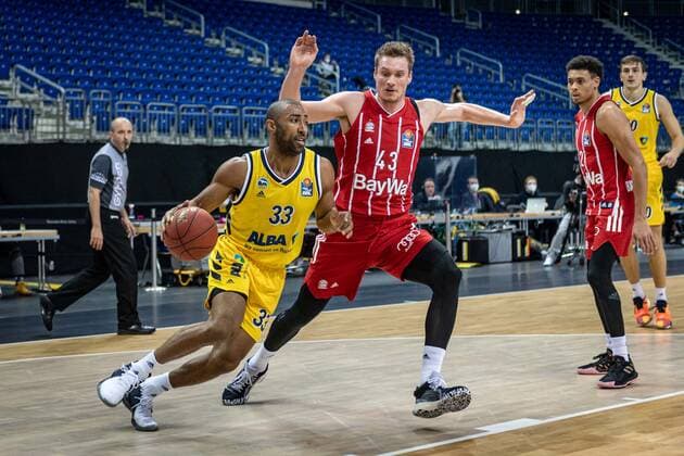 Basketball Berlin 03 01 2021 Season 2020 2021 easyCredit BBL 1 Bundesliga Alba Berlin vs FC Bayern München Jayson Granger Alba Berlin, No 33 Leon Radosevic München, No 43