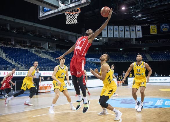 Basketball Berlin 03 01 2021 Season 2020 2021 easyCredit BBL 1 Bundesliga Alba Berlin vs FC Bayern Munich vl Simone Fontecchio 20 ALB , JaJuan Johnson 25 BAY , Johannes Thiemann 32 ALB , Jayson Granger 33 ALB