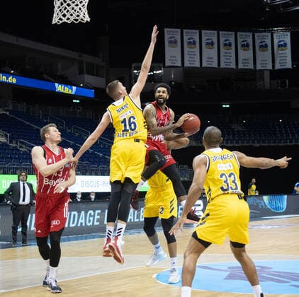 Basketball Berlin 03 01 2021 Season 2020 2021 easyCredit BBL 1 Bundesliga Alba Berlin vs FC Bayern Munich vl Leon Radosevic 43 BAY , Kresimir Nikic 16 ALB , D J Seeley 4 BAY and Jayson Granger 33 ALB