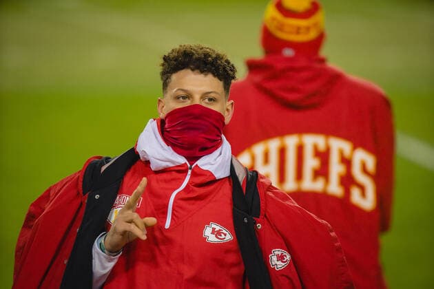 Kansas City Chiefs quarterback Patrick Mahomes (15) acknowledges the fans while resting against the Los Angeles Chargers at Arrowhead Stadium in Kansas City on Sunday, January 03, 2021.  KCP20210123130 KYLExRIVAS