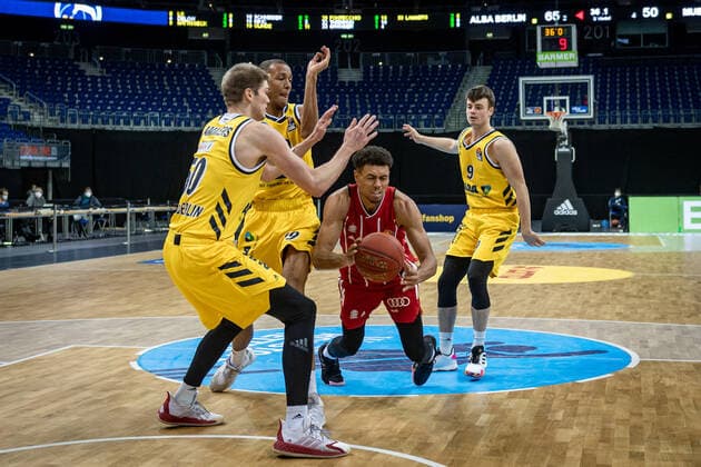 Basketball Berlin 03 01 2021 Season 2020 2021 easyCredit BBL 1 Bundesliga Alba Berlin vs FC Bayern Munich Wade Baldwin Munich, No 02 falls Ben Lammers Alba Berlin, No 50 Louis Olinde Alba Berlin, No 19 Jonas Mattisseck Alba Berlin, No 09
