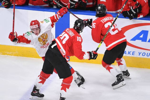 210105 Philip Tomasino of Canada collides with Danil Chaika of Russia during the 2021 IIHF World Junior Championship semifinal between Canada and Russia on January 4, 2021 in Edmonton Photo Andy Devlin BILDBYRAN COP 306 AD0008 bbeng ishockey ice hockey jvm junior vm u20 2021 iihf world junior championship world juniors semifinal canada kanada russia ryssland,  Copyright: ANDYxDEVLIN BB210105BB037