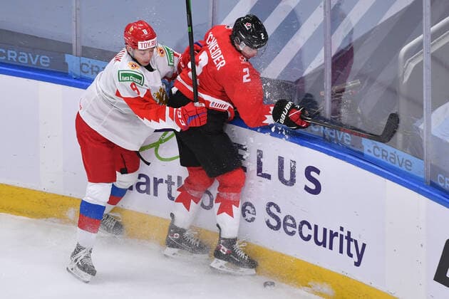 210105 Arseni Gritsyuk of Russia collides with Braden Schneider of Canada during the 2021 IIHF World Junior Championship semifinal between Canada and Russia on January 4, 2021 in Edmonton Photo Andy Devlin BILDBYRAN COP 306 AD0008 bbeng ishockey ice hockey jvm junior vm u20 2021 iihf world junior championship world juniors semifinal canada kanada russia ryssland,  Copyright: ANDYxDEVLIN BB210105BB040
