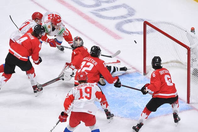 210105 Marat Khusnutdinov of Russia shoots the puck wide of the Canadian net during the 2021 IIHF World Junior Championship semifinal between Canada and Russia on January 4, 2021 in Edmonton Photo Andy Devlin BILDBYRAN COP 306 AD0008 bbeng ishockey ice hockey jvm junior vm u20 2021 iihf world junior championship world juniors semifinal canada kanada russia ryssland,  Copyright: ANDYxDEVLIN BB210105BB041