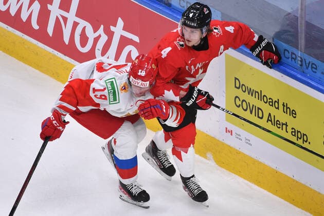 210105 Vasili Podkolzin of Russia collides with Bowen Byram of Canada during the 2021 IIHF World Junior Championship semifinal between Canada and Russia on January 4, 2021 in Edmonton Photo Andy Devlin BILDBYRAN COP 306 AD0008 bbeng ishockey ice hockey jvm junior vm u20 2021 iihf world junior championship world juniors semifinal canada kanada russia ryssland,  Copyright: ANDYxDEVLIN BB210105BB042