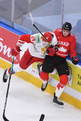 210105 Ilya Safonov of Russia collides with Thomas Harley of Canada during the 2021 IIHF World Junior Championship semifinal between Canada and Russia on January 4, 2021 in Edmonton Photo Andy Devlin BILDBYRAN COP 306 AD0008 bbeng ishockey ice hockey jvm junior vm u20 2021 iihf world junior championship world juniors semifinal canada kanada russia ryssland,  Copyright: ANDYxDEVLIN BB210105BB047