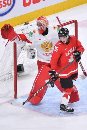 210105 Philip Tomasino of Canada gets his skate caught in the pad of Yaroslav Askarov of Russia during the 2021 IIHF World Junior Championship semifinal between Canada and Russia on January 4, 2021 in Edmonton Photo Andy Devlin BILDBYRAN COP 306 AD0008 bbeng ishockey ice hockey jvm junior vm u20 2021 iihf world junior championship world juniors semifinal canada kanada russia ryssland,  Copyright: ANDYxDEVLIN BB210105BB048