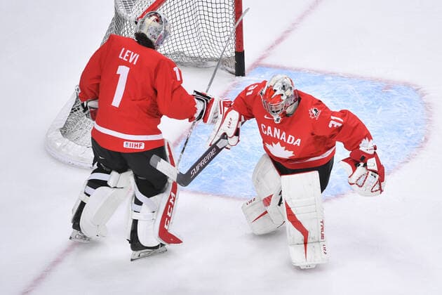 210106 Dylan Garand and Devon Levi of Canada exchange spots during warm up before the 2021 IIHF World Junior Championship final between USA and Canada on January 6, 2021 in Edmonton Photo Andy Devlin BILDBYRAN COP 306 AD0012 bbeng ishockey ice hockey jvm junior vm u20 2021 iihf world junior championship world juniors final usa canada kanada,  Copyright: ANDYxDEVLIN BB210106BB029