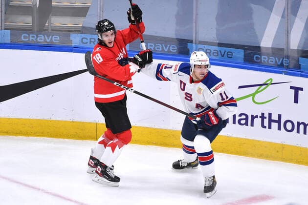 210106 Peyton Krebs of Canada collides with Brock Faber of USA during the 2021 IIHF World Junior Championship final between USA and Canada on January 6, 2021 in Edmonton Photo Andy Devlin BILDBYRAN COP 306 AD0012 bbeng ishockey ice hockey jvm junior vm u20 2021 iihf world junior championship world juniors final usa canada kanada,  Copyright: ANDYxDEVLIN BB210106BB059