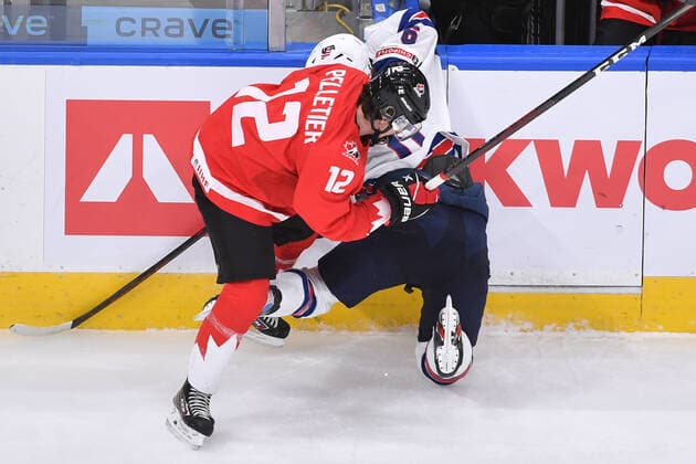 210106 Jakob Pelletier of Canada takes Trevor Zegras of USA hard into the boards during the 2021 IIHF World Junior Championship final between USA and Canada on January 6, 2021 in Edmonton Photo Andy Devlin BILDBYRAN COP 306 AD0012 bbeng ishockey ice hockey jvm junior vm u20 2021 iihf world junior championship world juniors final usa canada kanada,  Copyright: ANDYxDEVLIN BB210106BB080