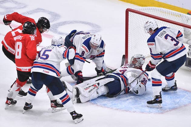 210106 Dylan Cozens and Peyton Krebs of Canada dig at the puck underneath Spencer Knight of USA during the 2021 IIHF World Junior Championship final between USA and Canada on January 6, 2021 in Edmonton Photo Andy Devlin BILDBYRAN COP 306 AD0012 bbeng ishockey ice hockey jvm junior vm u20 2021 iihf world junior championship world juniors final usa canada kanada,  Copyright: ANDYxDEVLIN BB210106BB139