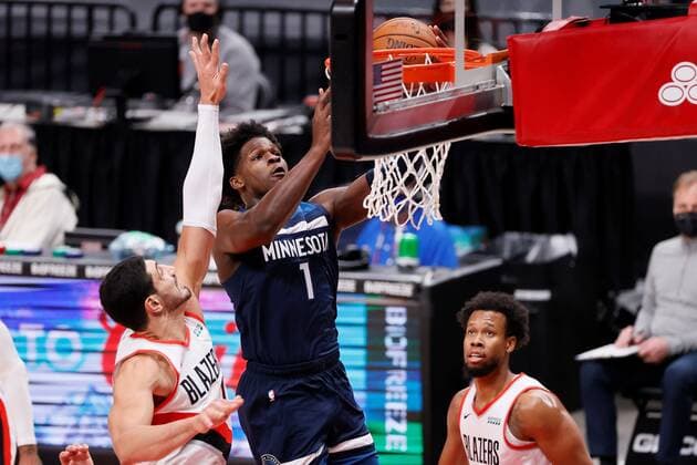 Minnesota Timberwolves shooting guard Anthony Edwards (1) drives to the basket as Portland Trail Blazers center Enes Kanter (11) defends during an NBA, Basketball Herren, USA game, between the Timberwolves and the Trail Blazers, at the Moda Center in Portland, Oregon, US, 07 January 2021. Timberwolves vs Portland Trail Blazers !ACHTUNG: NUR REDAKTIONELLE NUTZUNG!  Copyright: xSOOBUMxIMx AME8354 20210108-637456806218681556