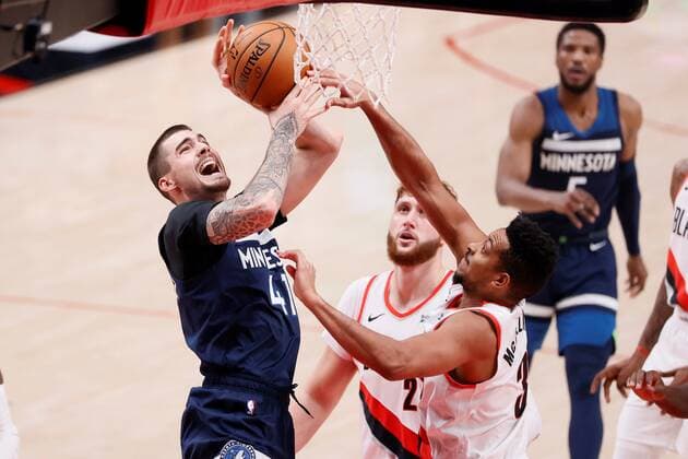 Minnesota Timberwolves power forward Juancho Hernangomez (41) is fouled while shooting by Portland Trail Blazers shooting guard CJ McCollum (3) during an NBA, Basketball Herren, USA game, between the Timberwolves and the Trail Blazers, at the Moda Center in Portland, Oregon, US, 07 January 2021. Timberwolves vs Portland Trail Blazers !ACHTUNG: NUR REDAKTIONELLE NUTZUNG!  Copyright: xSOOBUMxIMx AME8371 20210108-637456825379445734