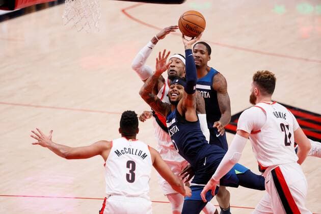 Minnesota Timberwolves shooting guard D Angelo Russell (0) is fouled while shooting by Portland Trail Blazers power forward Robert Covington (behind) during an NBA, Basketball Herren, USA game, between the Timberwolves and the Trail Blazers, at the Moda Center in Portland, Oregon, US, 07 January 2021. Timberwolves vs Portland Trail Blazers !ACHTUNG: NUR REDAKTIONELLE NUTZUNG!  Copyright: xSOOBUMxIMx AME8373 20210108-637456833983237921