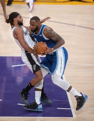 January 7, 2021, Los Angeles, California, USA: LeBron James 23 of the Los Angeles Lakers is defended by Patty Mills 8 of the San Antonio Spurs during their regular season NBA, Basketball Herren, USA game on Thursday January 7, 2021 at the Staples Center in Los Angeles, California. Lakers lose to Spurs 118-109. JAVIER ROJAS PI Los Angeles USA - ZUMAp124 20210107_zaa_p124_035 Copyright: xJavierxRojasx