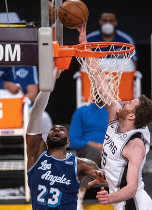 January 7, 2021, Los Angeles, California, USA: LeBron James 23 of the Los Angeles Lakers is blocked by Jakob Poeltl 25 of the San Antonio Spurs during their regular season NBA, Basketball Herren, USA game on Thursday January 7, 2021 at the Staples Center in Los Angeles, California. Lakers lose to Spurs 118-109. JAVIER ROJAS PI Los Angeles USA - ZUMAp124 20210107_zaa_p124_039 Copyright: xJavierxRojasx