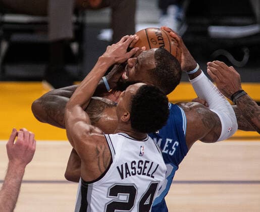 January 7, 2021, Los Angeles, California, USA: LeBron James 23 of the Los Angeles Lakers is defended by Devin Vassell 24 of the San Antonio Spurs during their regular season NBA, Basketball Herren, USA game on Thursday January 7, 2021 at the Staples Center in Los Angeles, California. Lakers lose to Spurs 118-109. JAVIER ROJAS PI Los Angeles USA - ZUMAp124 20210107_zaa_p124_042 Copyright: xJavierxRojasx
