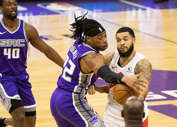 January 8, 2021, Sacramento, CA, USA: Sacramento Kings forward Richaun Holmes (22) battles Toronto Raptors guard Fred VanVleet (23) for control off the ball during a game at the Golden 1 Center on Friday, Jan 8, 2021 in Sacramento. Sacramento USA - ZUMAj89_ 20210108_zaf_j89_002 Copyright: xPaulxKitagakixJr.x