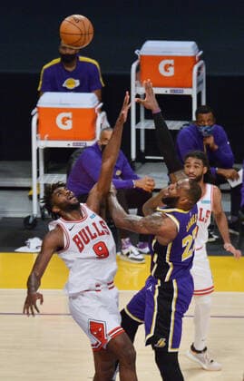 Los Angeles Lakers LeBron James scores over Chicago Bulls Patrick Williams during the fourth quarter at Staples Center in Los Angeles on Friday, January 8, 2021. The Lakers defeated the Bulls 117-115.  LAP2021010801 JIMxRUYMEN
