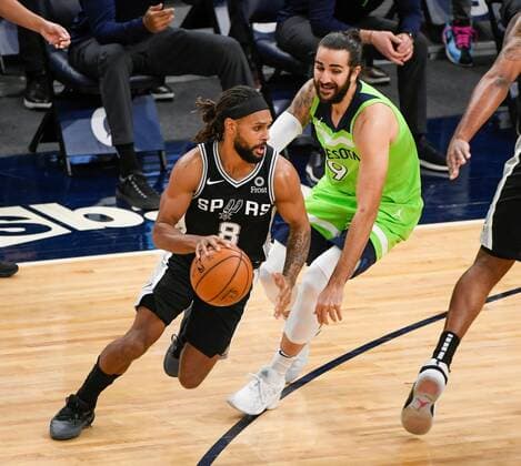 Minnesota Timberwolves guard Ricky Rubio (R) defends against San Antonio Spurs guard Patty Mills (L) during the first half of the NBA, Basketball Herren, USA basketball game between the San Antonio Spurs and the Minnesota Timberwolves at Target Center in Minneapolis, Minnesota, USA, 9 January, 2021. San Antonio Spurs at Minnesota Timberwolves !ACHTUNG: NUR REDAKTIONELLE NUTZUNG!  Copyright: xCRAIGxLASSIGx AME8643 20210110-637458461328338257