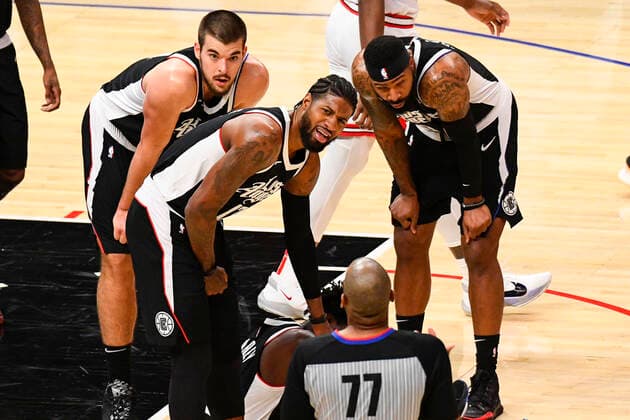 LOS ANGELES, CA - JANUARY 10: Los Angeles Clippers Guard Paul George (13) and Los Angeles Clippers Center Ivica Zubac (40) look at the official after a foul call during a NBA, Basketball Herren, USA game between the Chicago Bulls and the Los Angeles Clippers on January 10, 2021 at STAPLES Center in Los Angeles, CA.The game was played without fans due to the COVID-19 pandemic. (Photo by Brian Rothmuller Icon Sportswire) NBA: JAN 10 Bulls at Clippers Icon210110005