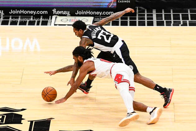 LOS ANGELES, CA - JANUARY 10: Los Angeles Clippers Guard Lou Williams (23) steals the ball from Chicago Bulls Guard Coby White (0) during a NBA, Basketball Herren, USA game between the Chicago Bulls and the Los Angeles Clippers on January 10, 2021 at STAPLES Center in Los Angeles, CA.The game was played without fans due to the COVID-19 pandemic. (Photo by Brian Rothmuller Icon Sportswire) NBA: JAN 10 Bulls at Clippers Icon210110014