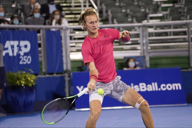 January 11, 2021, Delray Beach, Florida, United States: Delray Beach, FL - January 11, 2021: Sebastian Korda(USA) plays John Isner(USA) during their Quarter-Final match at the 2021 Delray Beach Open by Vitacost.com. Delray Beach United States - ZUMApa3_ 0109732594st Copyright: xAndrewxPatronx