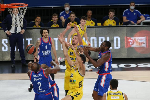 Shane Larkin (0) , Chris Singleton (2) , Bryant Dunston (42) of Anadolu Efes and Kresimir Nikic (16) , Simone Fontecchio (20) of Alba Berlin during the Turksih Airlines Euroleague Basketball match between Anadolu Efes and Alba Berlin at Sinan Erdem Arena in Istanbul , Turkey on January 12 , 2021. 