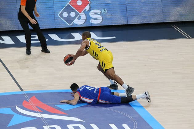 Dogus Balbay of Anadolu Efes and Jayson Granger (33) of Alba Berlin during the Turksih Airlines Euroleague Basketball match between Anadolu Efes and Alba Berlin at Sinan Erdem Arena in Istanbul , Turkey on January 12 , 2021. 