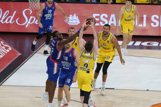 Bryant Dunston (42) , Adrien Moerman (18) of Anadolu Efes and Jonas Mattisseck (9) , Johannes Thiemann (32) of Alba Berlin during the Turksih Airlines Euroleague Basketball match between Anadolu Efes and Alba Berlin at Sinan Erdem Arena in Istanbul , Turkey on January 12 , 2021. 