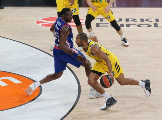 Bryant Dunston of Anadolu Efes and Jason Granger (33) of Alba Berlin during the Turksih Airlines Euroleague Basketball match between Anadolu Efes and Alba Berlin at Sinan Erdem Arena in Istanbul , Turkey on January 12 , 2021. 
