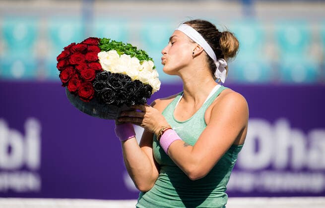 January 13, 2021, Abu Dhabi, UNITED ARAB EMIRATES: Aryna Sabalenka of Belarus poses with flowers after winning the final of the 2021 Abu Dhabi WTA, Tennis Damen Womens Tennis Open WTA 500 tournament against Veronika Kudermetova of Russia Abu Dhabi UNITED ARAB EMIRATES - ZUMAa181 20210113_zaa_a181_013 Copyright: xRobxPrangex