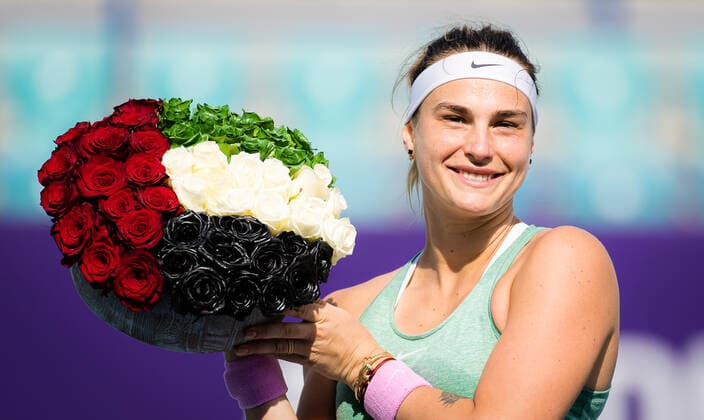 January 13, 2021, Abu Dhabi, UNITED ARAB EMIRATES: Aryna Sabalenka of Belarus poses with flowers after winning the final of the 2021 Abu Dhabi WTA, Tennis Damen Womens Tennis Open WTA 500 tournament against Veronika Kudermetova of Russia Abu Dhabi UNITED ARAB EMIRATES - ZUMAa181 20210113_zaa_a181_015 Copyright: xRobxPrangex