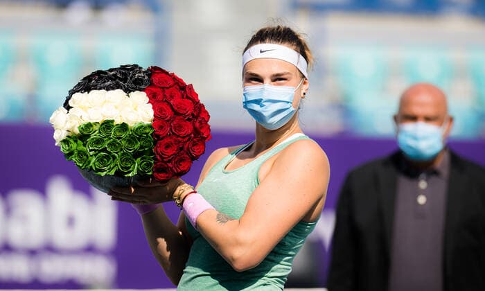 January 13, 2021, Abu Dhabi, UNITED ARAB EMIRATES: Aryna Sabalenka of Belarus with her championship flowers after winning the final of the 2021 Abu Dhabi WTA, Tennis Damen Womens Tennis Open WTA 500 tournament against Veronika Kudermetova of Russia Abu Dhabi UNITED ARAB EMIRATES - ZUMAa181 20210113_zaa_a181_064 Copyright: xRobxPrangex