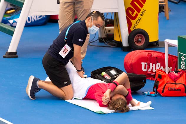 January 13, 2021, Delray Beach, Florida, United States: Sebastian Korda(USA) having work done on him by the trainer loses 36 36 to Hubert Hurkacz(POL) during the finals at the 2021 Delray Beach Open by Vitacost.com. Delray Beach United States - ZUMApa3_ 0109886620st Copyright: xAndrewxPatronx