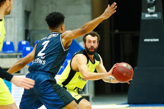 13 Matchday of the easyCredit BBL Basketball Bundesliga at the Arena Hohenlohe in Ilshofen Season 2020 2021 HAKRO Merlins Crailsheim vs Medi Bayreuth Trae Bell Haynes HAKRO Merlins Crailsheim 2 left Bastian Doreth Medi Bayreuth 10 right