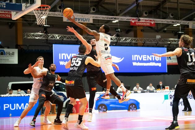 BARMER 2 Basketball Bundesliga ProA Season 2020 2021 Matchday 16 on 17 1 2021 Science City Jena vs VfL Kirchheim Knights center Frederick Zamal Nixon Jena at the basket against Karlo Miksic 55 Kirchheim Sparkassen Arena Jena