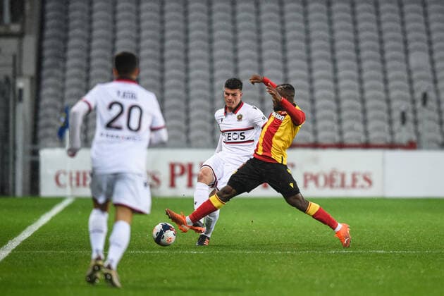 Flavius DANILIUC ( 5 - Nice ) - Youcef ATAL ( 20 - Nice ) - Ignatius GANAGO ( 9 - Lens ) - FOOTBALL : Lens vs Nice - Ligue 1 - Lens - 23 01 2021 FedericoPestellini Panoramic 